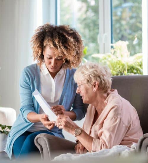 Senior and caregiver choosing the right level of home care